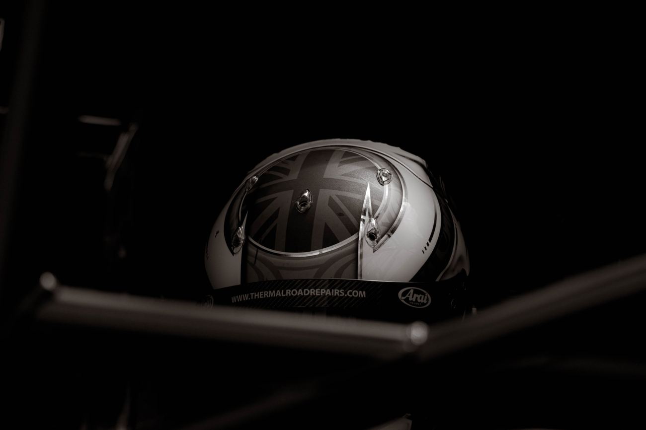 A race helmet waiting in the garage
