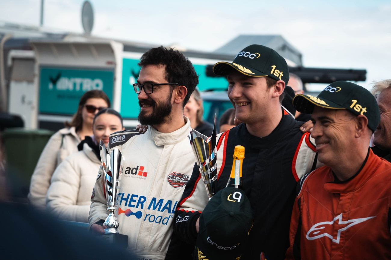 Drivers celebrating on the podium at Silverstone