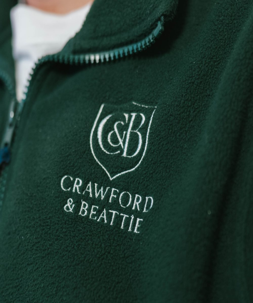 Crawford and Beattie crest embroidered on a green fleece