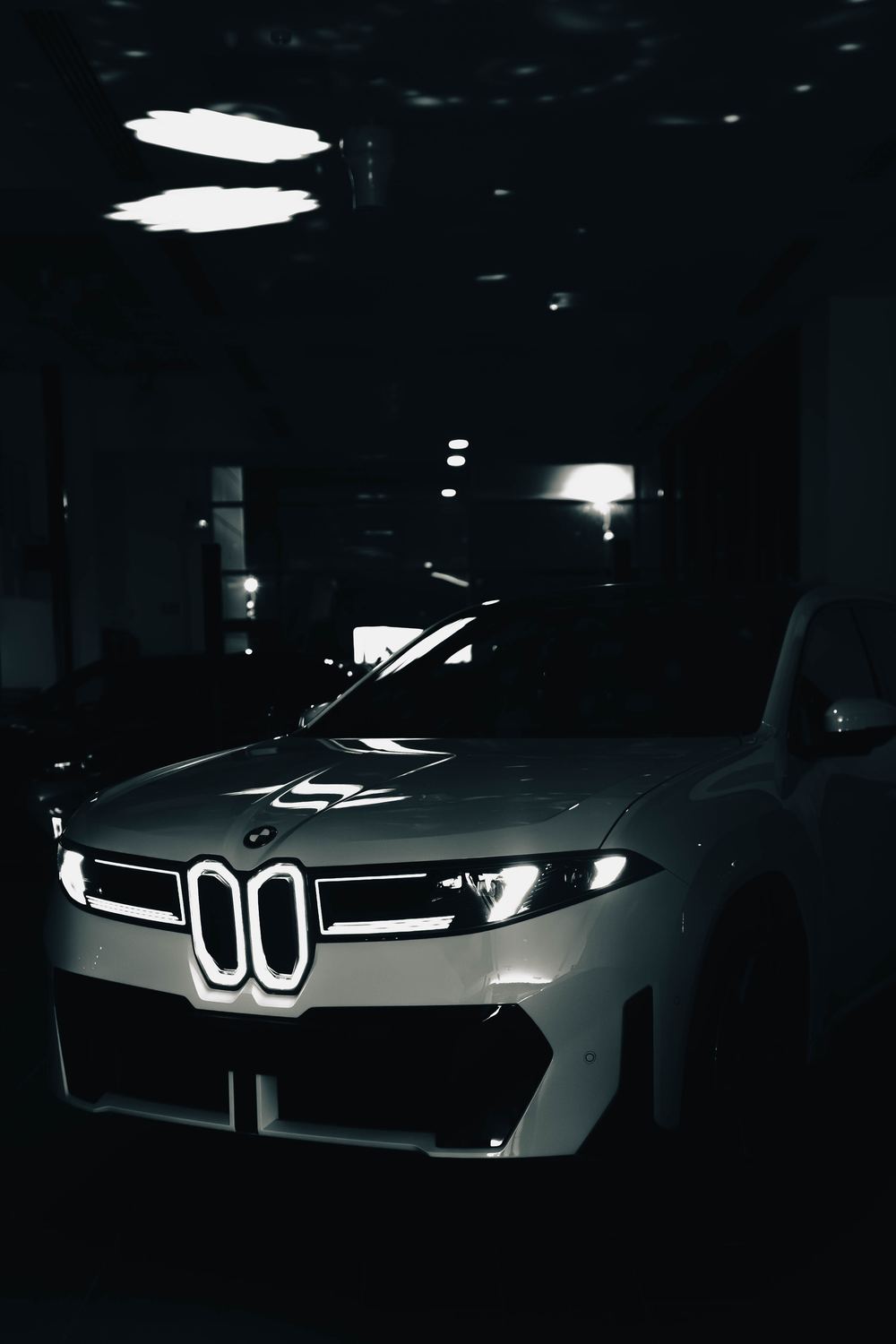 Black and white front view of the new BMW iX3